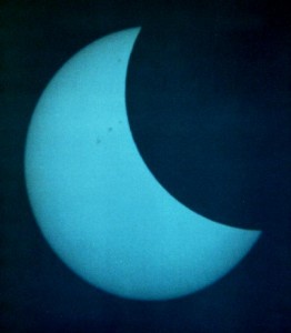 Solar eclipse - August 11th 1999 from Athens. Some sunspots visible. Projected on a sheet of paper from my TAL-1 reflector. Blue-2 filter used.